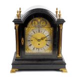 A good late 19th century ebonised triple fusee bracket or table clock The 8-inch arched brass dial