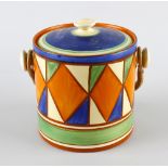 A Clarice Cliff Bizarre biscuit barrel, of cylindrical form decorated with geometric pattern and