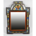 A Dutch wall mirror. The rectangular plate within wooden ogee-arched frame having inlaid glass