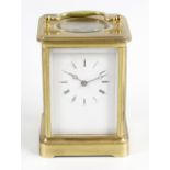 A late 19th century brass cased carriage clock, with 2-inch (5 cm) white roman dial, the two-train