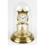 A 20th century 'anniversary' or torsion clock Having a 2.5-inch cream Arabic dial, the single-