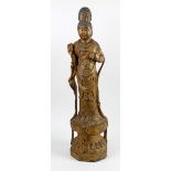 A large 19th century carved wooden figure. Probably modelled as Guan Yin, wearing elaborate beads