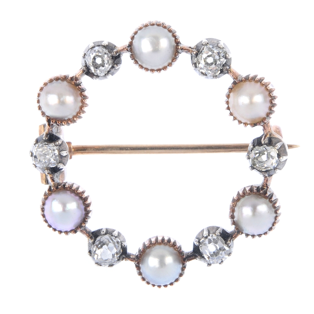 A late 19th century split pearl and diamond wreath brooch. Designed as an alternating split pearl