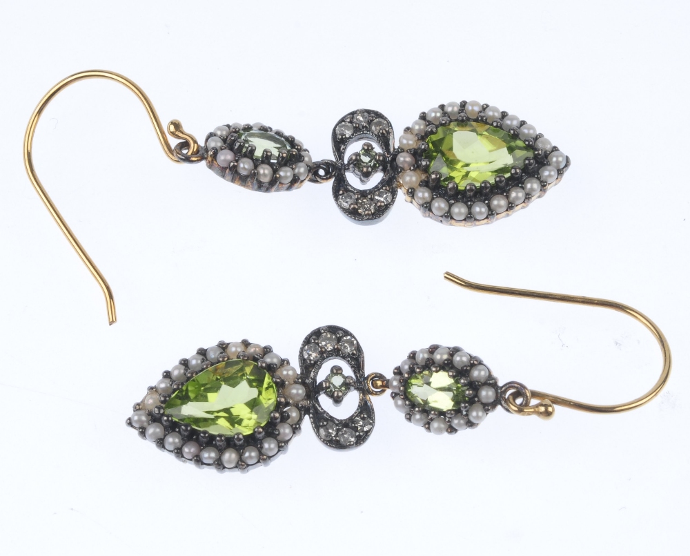 A pair of peridot, seed pearl and diamond ear pendants. Each designed as a pear-shape peridot within - Image 3 of 3