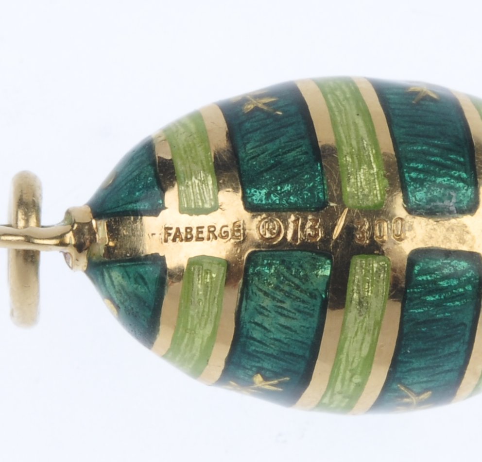 FABERGE - an 18ct gold enamel egg pendant. Designed as a series of green guilloche enamel bands, - Image 3 of 3