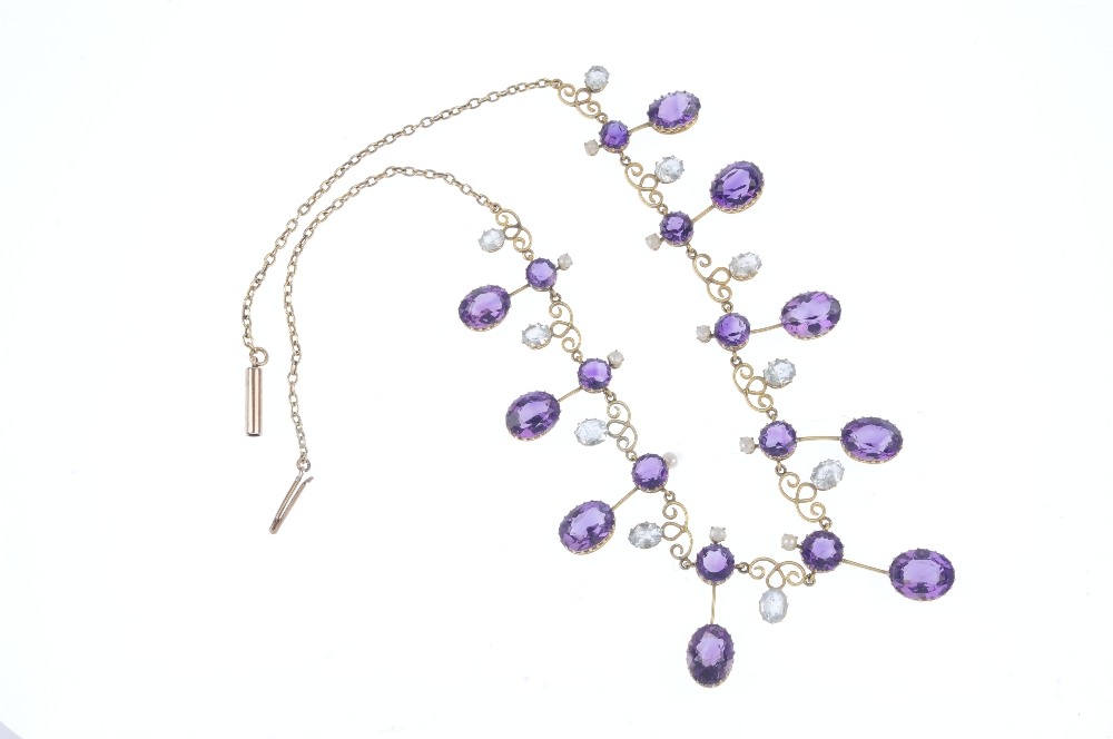 An early 20th century gold amethyst and aquamarine fringe necklace. Designed as a graduated series - Image 4 of 4