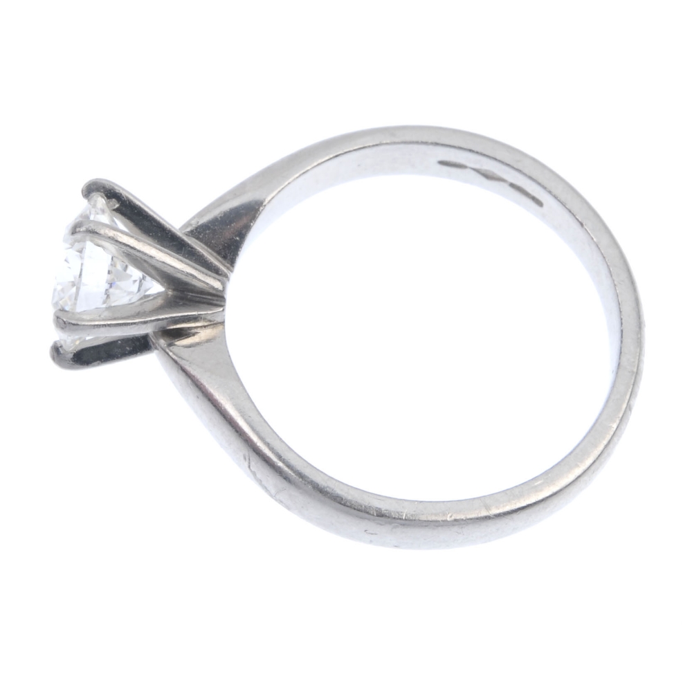 A platinum diamond single-stone ring. The brilliant-cut diamond, to the plain band. Estimated - Image 3 of 4