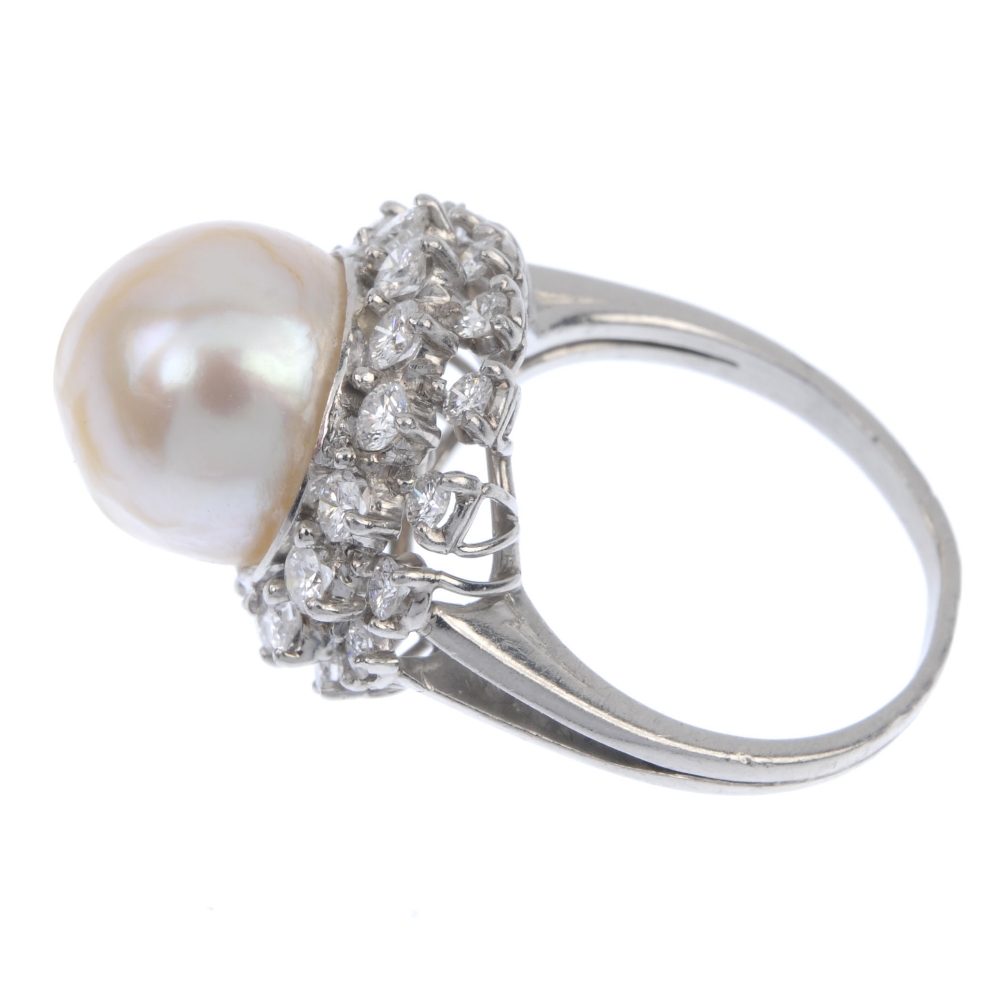 A cultured pearl and diamond cluster ring. The cultured pearl, measuring 20mms, within a brilliant- - Image 3 of 4