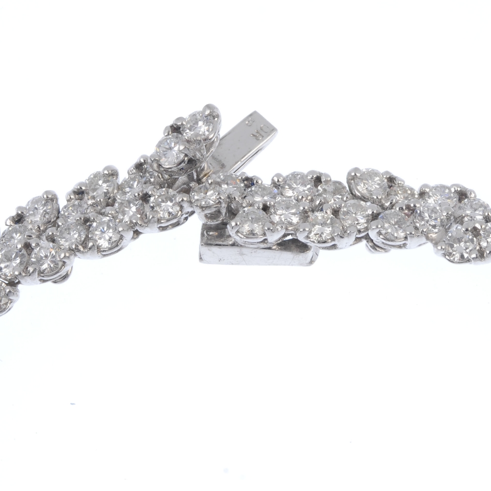 A diamond articulated collar. Comprising a series of five brilliant-cut diamonds, raised within - Image 3 of 4