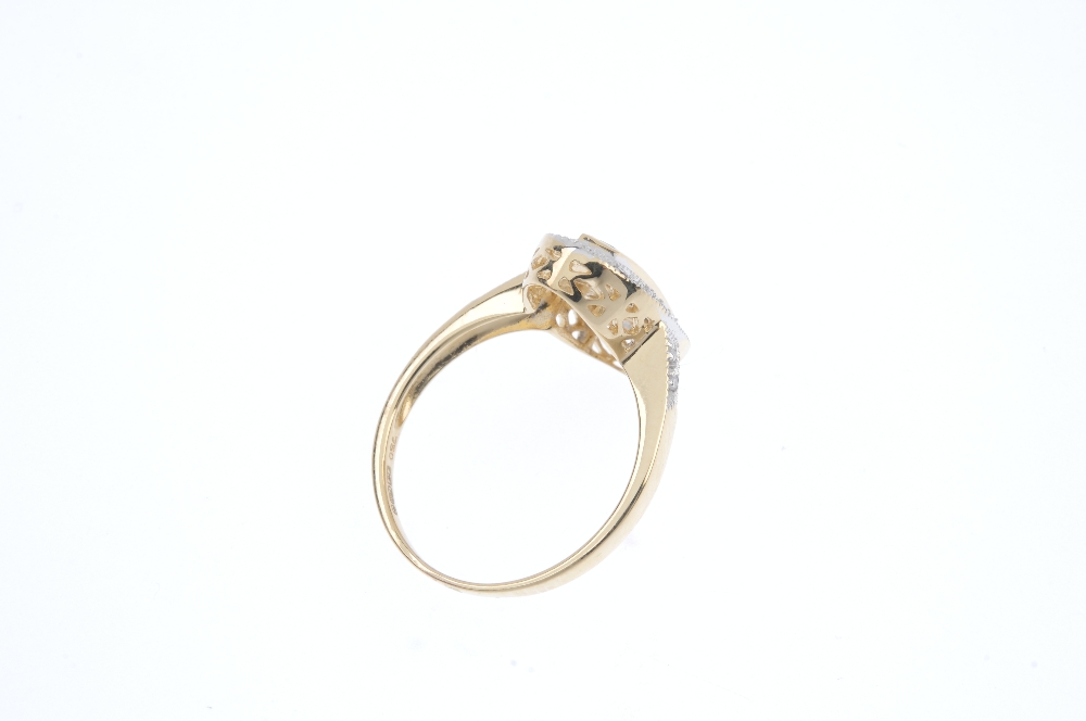 An 18ct gold sapphire and diamond ring. The square-shape sapphire line, within a channel setting, to - Image 4 of 4