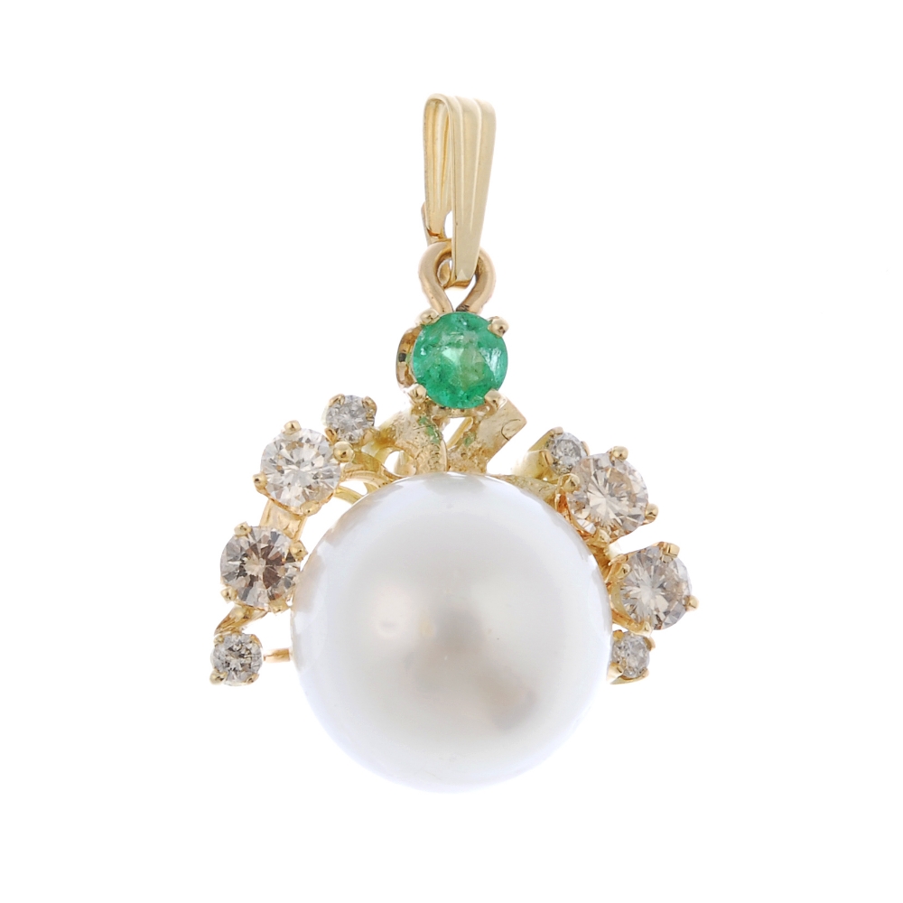 A cultured pearl, emerald and diamond pendant. The cultured pearl, measuring 13mms, with brilliant-
