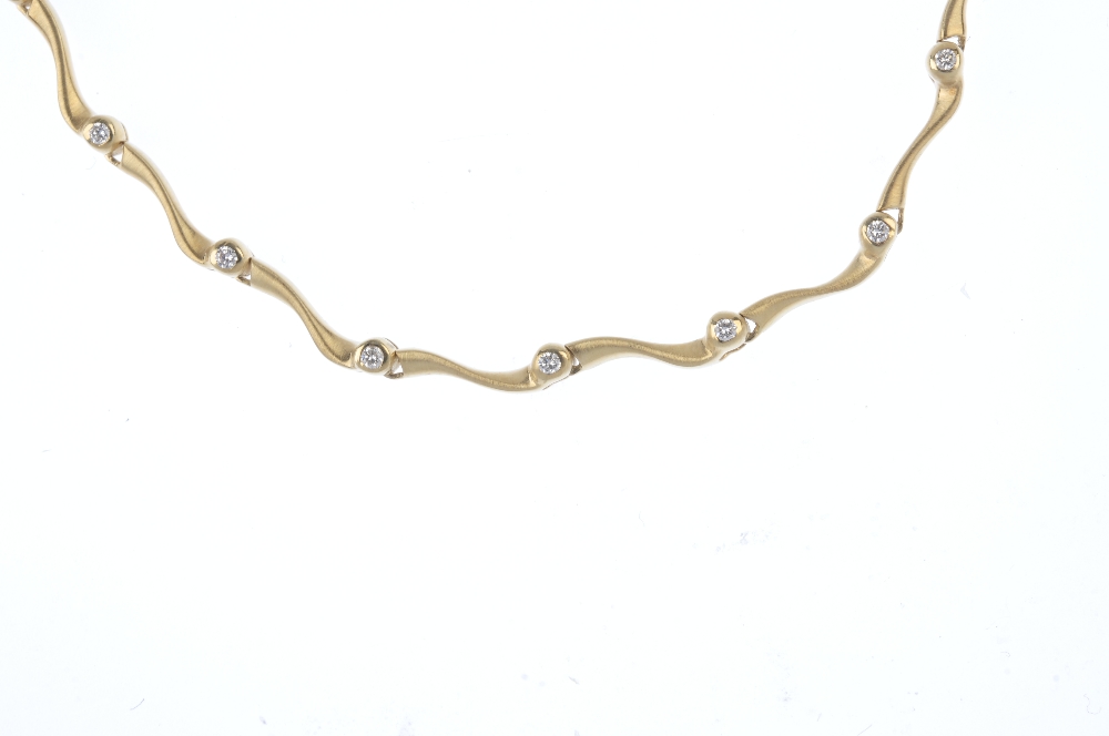 An 18ct gold diamond necklace. The front designed as a series of brilliant-cut diamond collet and - Image 2 of 4