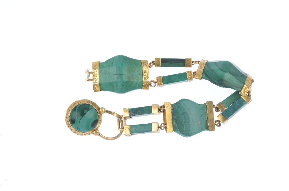 A late Victorian gold malachite bracelet, circa 1880. Designed as a series of curved malachite - Image 3 of 3