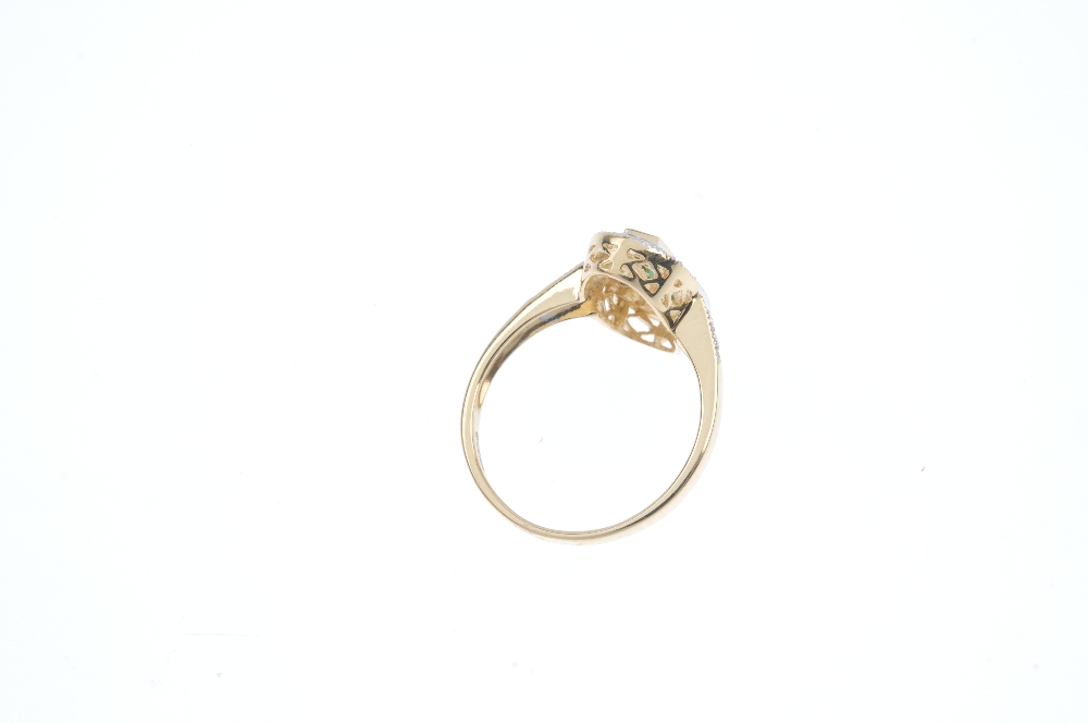 An 18ct gold emerald and diamond ring. The square-shape emerald line, within a channel-setting, to - Image 4 of 4