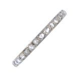 A diamond full-circle eternity ring. Designed as a series of rose-cut diamonds. Ring size P.