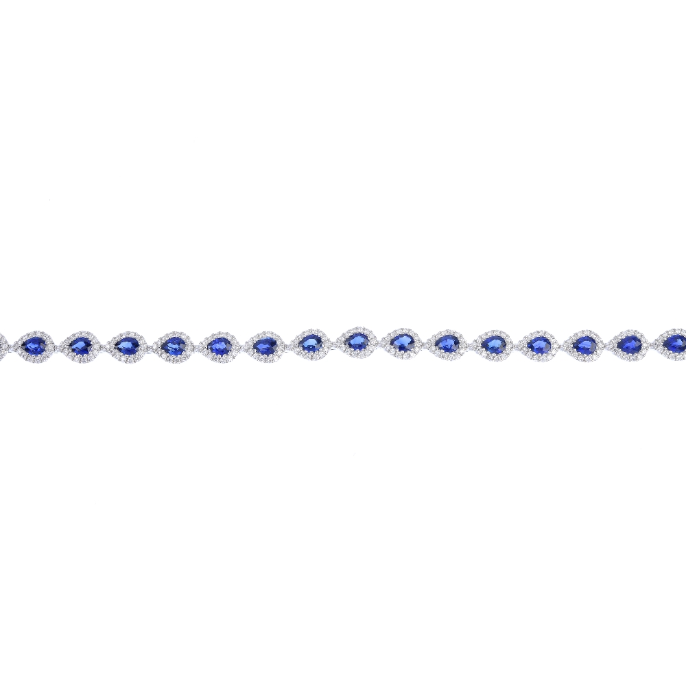 * A sapphire and diamond bracelet. Designed as a series of pear-shape sapphire and brilliant-cut