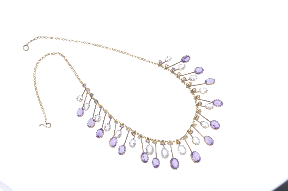 An amethyst and topaz fringe necklace. Designed as a series of graduated oval-shape amethyst and - Image 3 of 3