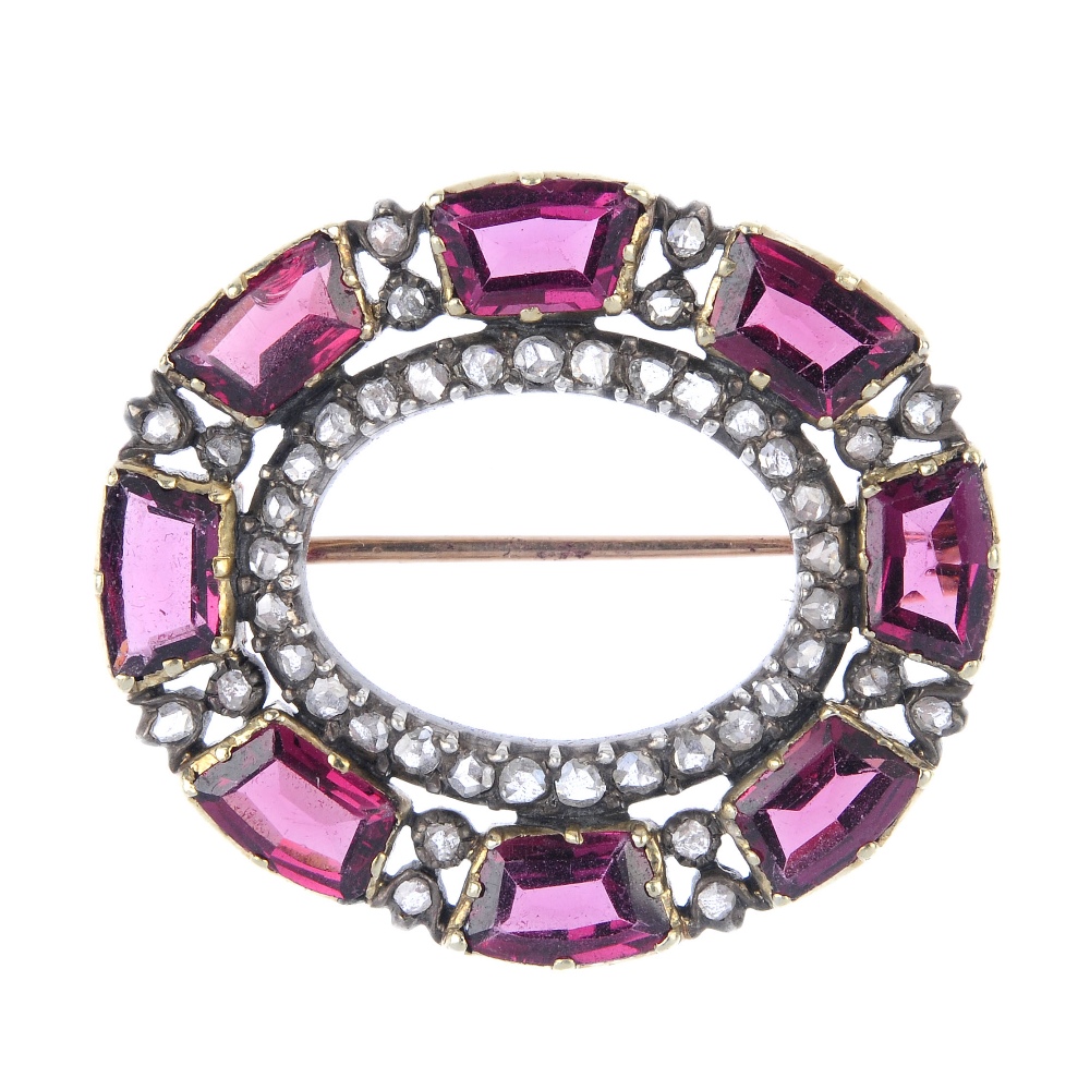 A mid 19th century gold, garnet and diamond brooch, retailed by Tessier. The fancy-shape garnet