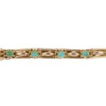 An early 20th century 15ct gold turquoise bracelet. Comprising a series of circular turquoise