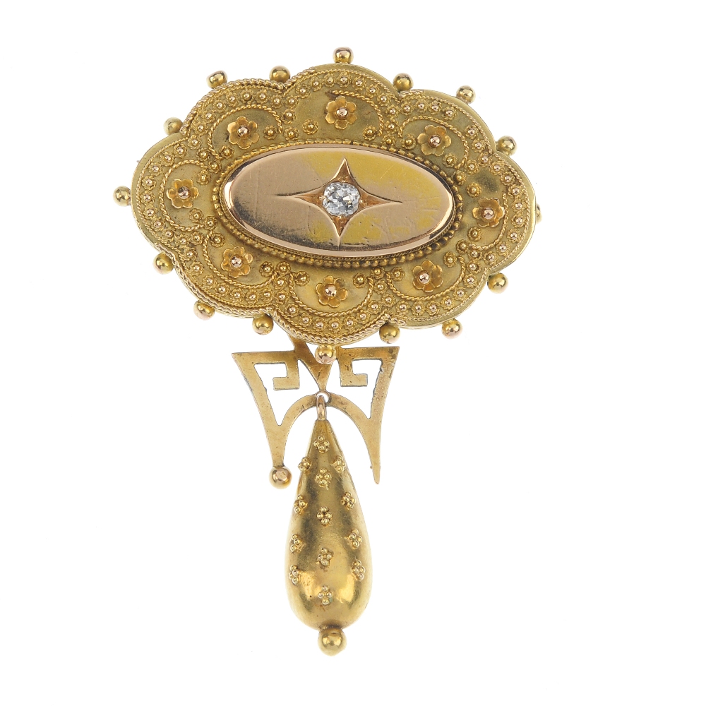 A late 19th century gold diamond brooch. The old-cut diamond oval panel, within a cannetille
