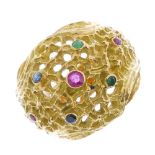 A sapphire, emerald and ruby ring. Designed as a textured openwork dome, with circular-shape