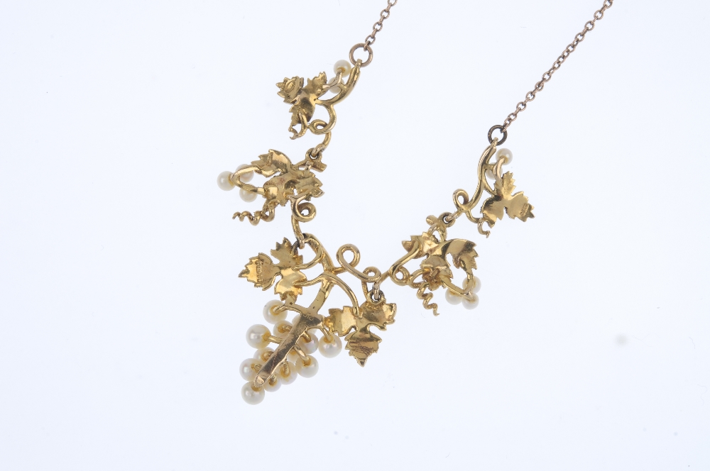 A 9ct gold seed pearl grape and vine necklace. Designed as a graduated series of seed pearl grapes - Image 2 of 3