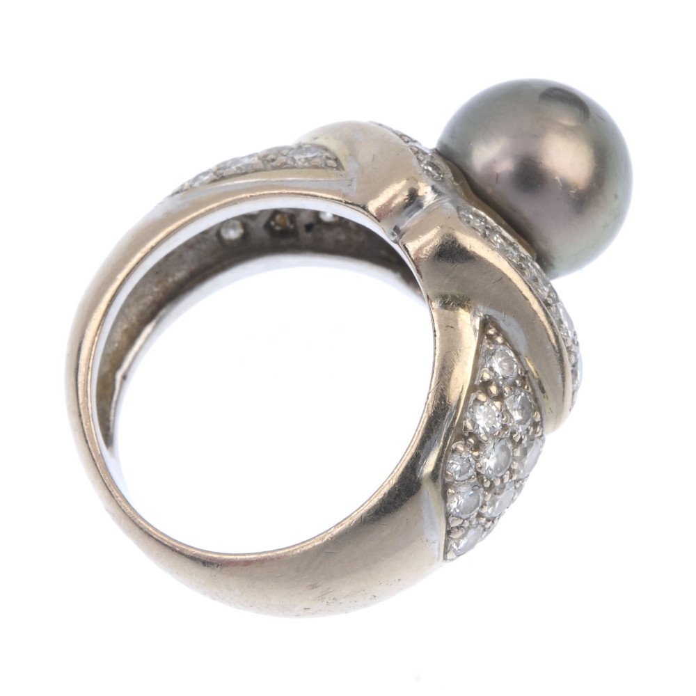 A cultured pearl and diamond dress ring. The grey cultured pearl, measuring approximately 10mms, - Image 4 of 4