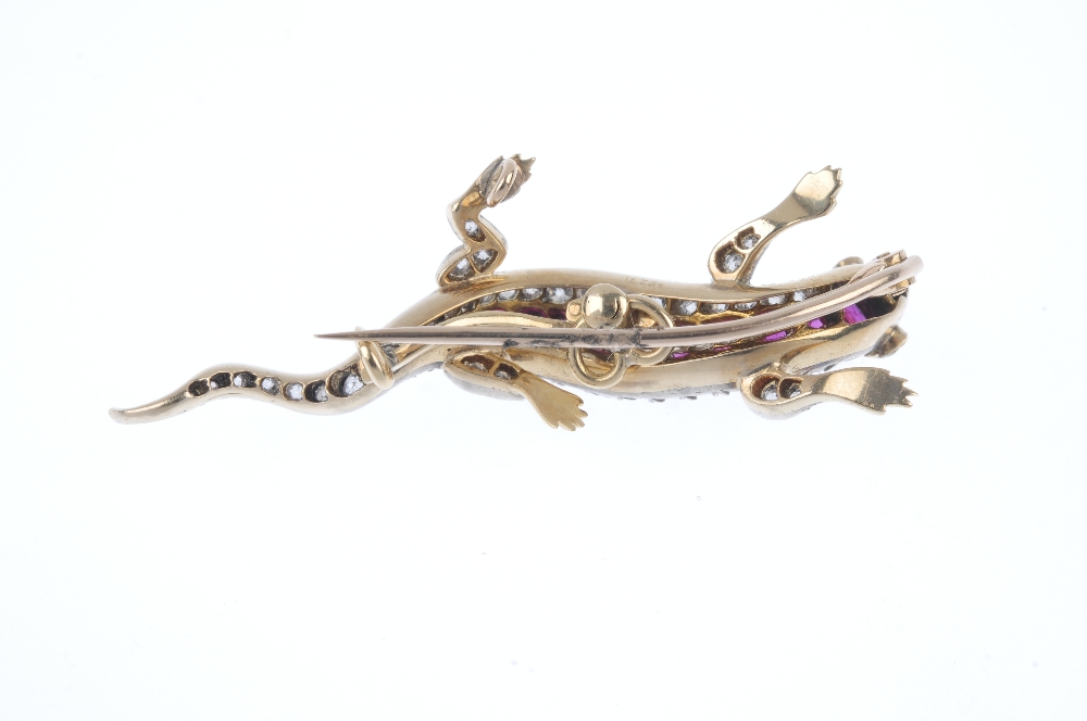 An early 20th century silver and gold, ruby, diamond and demantoid garnet lizard brooch. The - Image 3 of 3