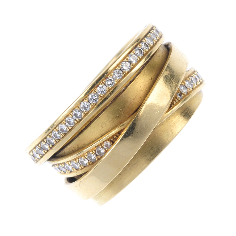 A diamond multi-row band ring. The overlapped bands, with brilliant-cut diamond line detail.