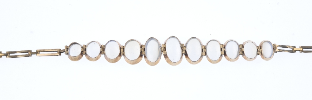 A moonstone bracelet. Designed as a graduated series of oval moonstone cabochon collets, to the - Image 3 of 3