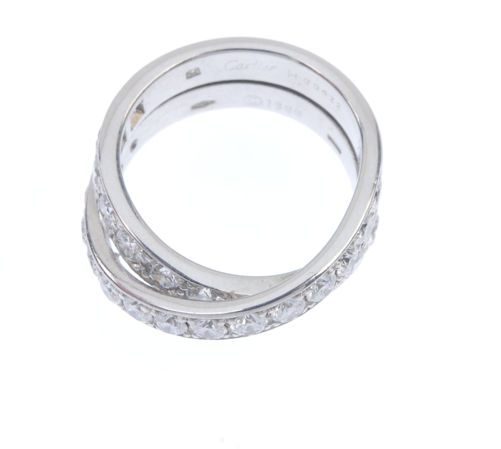 CARTIER - a diamond 'Paris Nouvelle Vague' ring. Comprising two brilliant-cut diamond crossover - Image 2 of 4