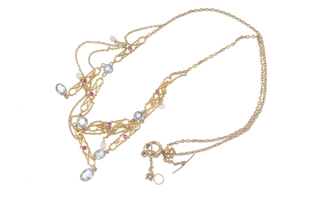 An aquamarine, ruby and seed pearl necklace. The front designed as a series of alternating - Image 3 of 3