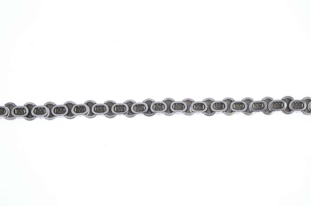 An 18ct gold diamond bracelet. Designed as a series of pave-set diamond links, with curved-link - Image 2 of 4