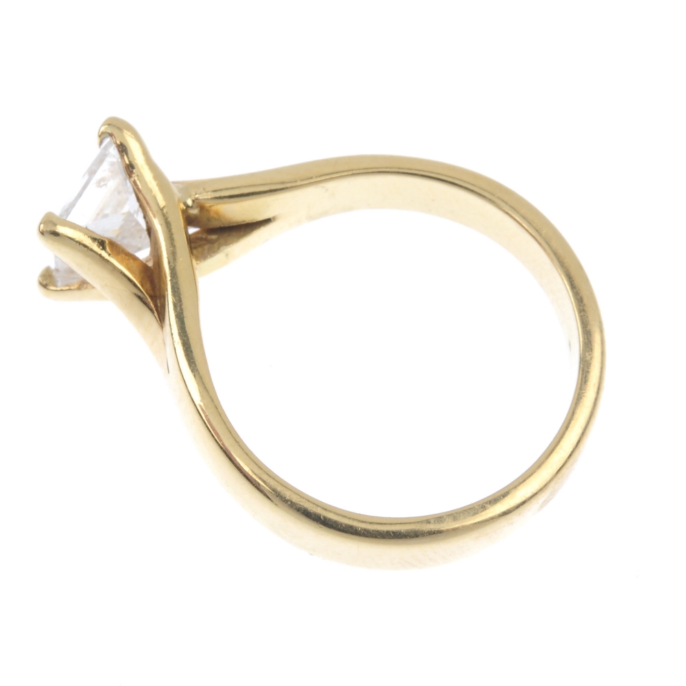 A diamond single-stone ring. The square-shape diamond, to the curved claw setting and plain band. - Image 3 of 4