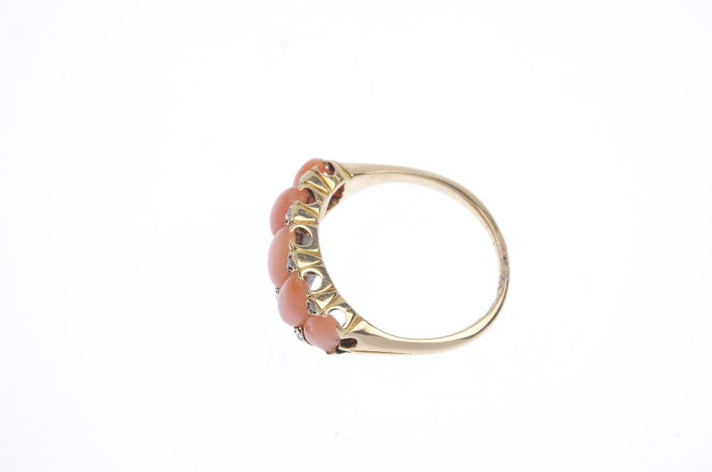 An early 20th century gold coral and diamond five-stone ring. Designed as a series of graduated oval - Image 3 of 4