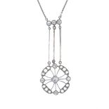 An early 20th century diamond pendant. The old and rose-cut diamond openwork panel, suspended from