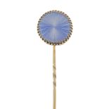 FABERGE - an enamel stickpin. The sunburst guilloche light blue enamel disc, within a multi-claw