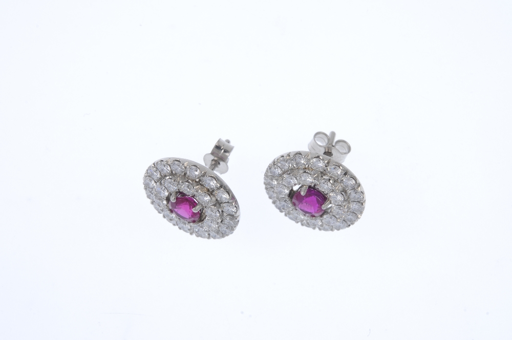 A pair of Burmese ruby and diamond cluster ear studs. Each designed as a circular-shape Burmese - Image 2 of 2