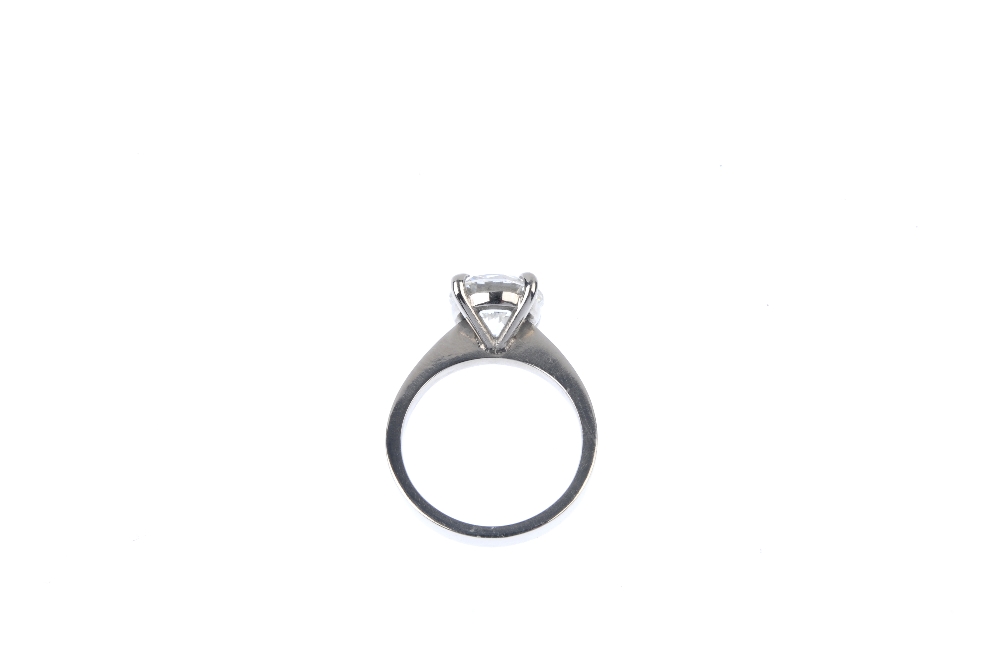 An 18ct gold diamond single-stone ring. The brilliant-cut diamond, weighing 3.02cts, to the plain - Image 4 of 4