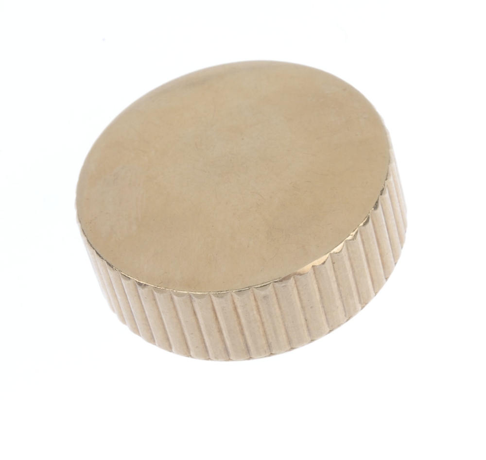 CARTIER - a 1940s 9ct gold pill box. Of circular outline, the grooved sides and slightly domed base, - Image 2 of 3