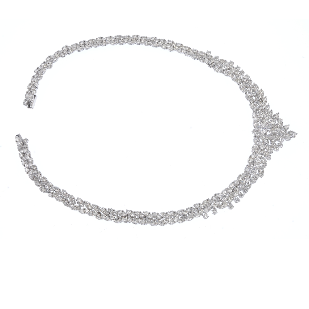 A diamond articulated collar. Comprising a series of five brilliant-cut diamonds, raised within - Image 4 of 4
