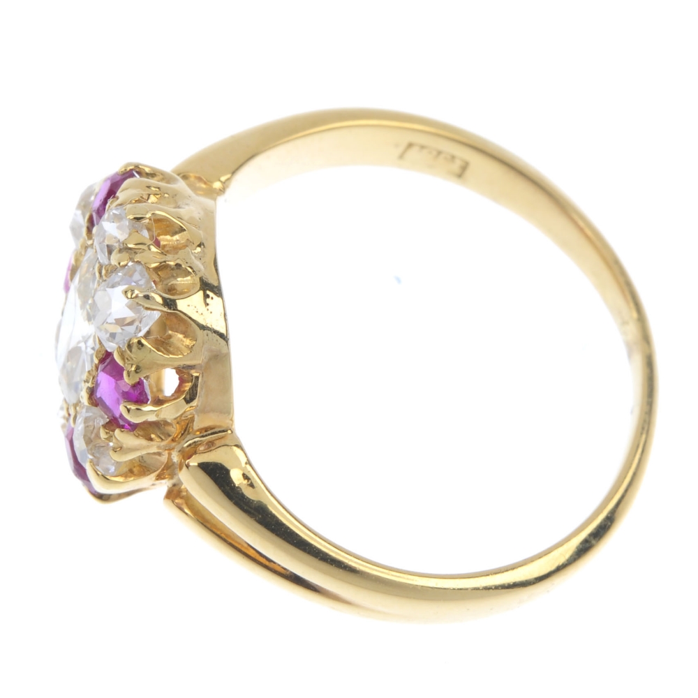 A diamond and ruby dress ring. The old-cut diamond, within a similarly-cut diamond and vari-shape - Image 3 of 4