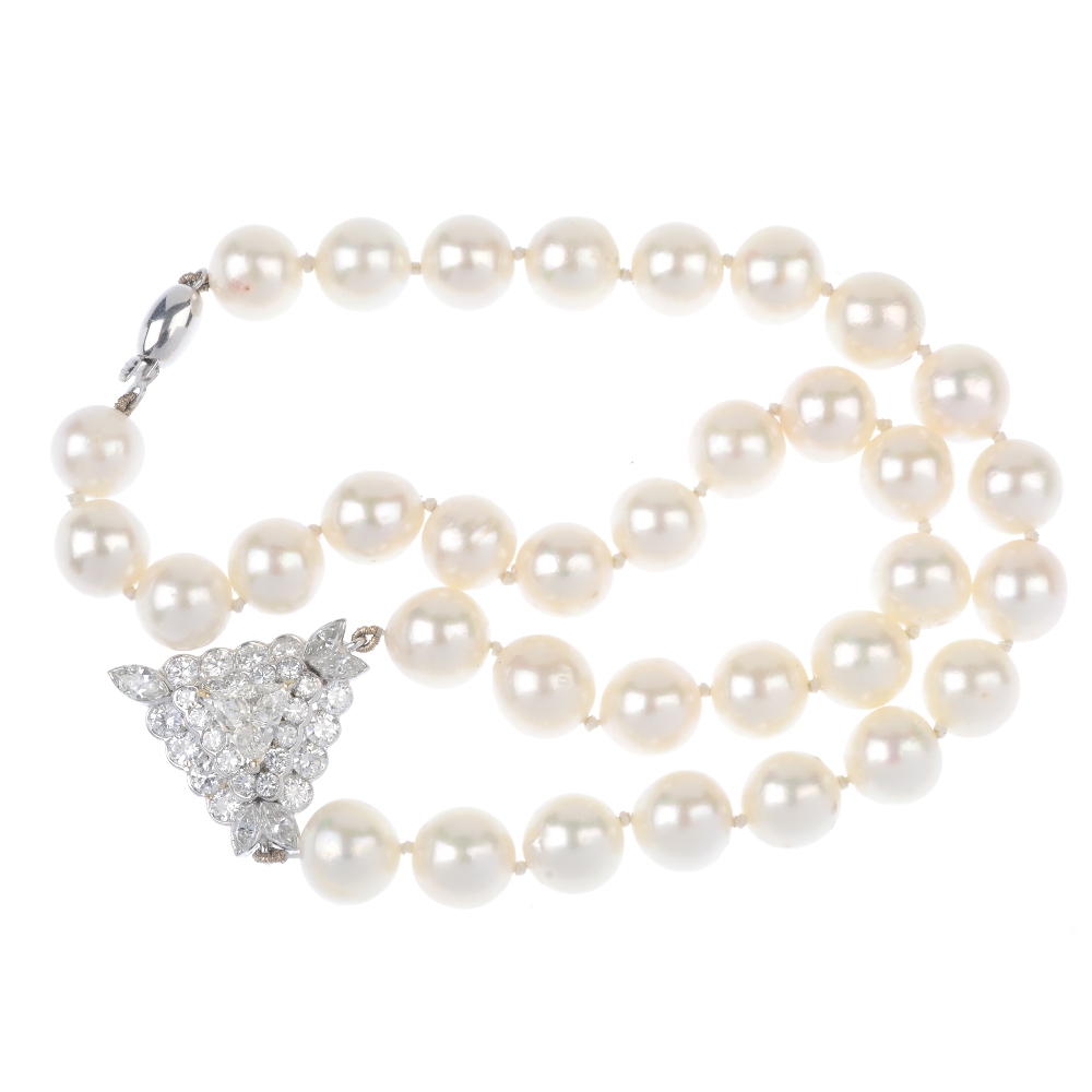 A diamond and cultured pearl single-strand necklace. The triangular-shape diamond, weighing 0. - Image 3 of 4