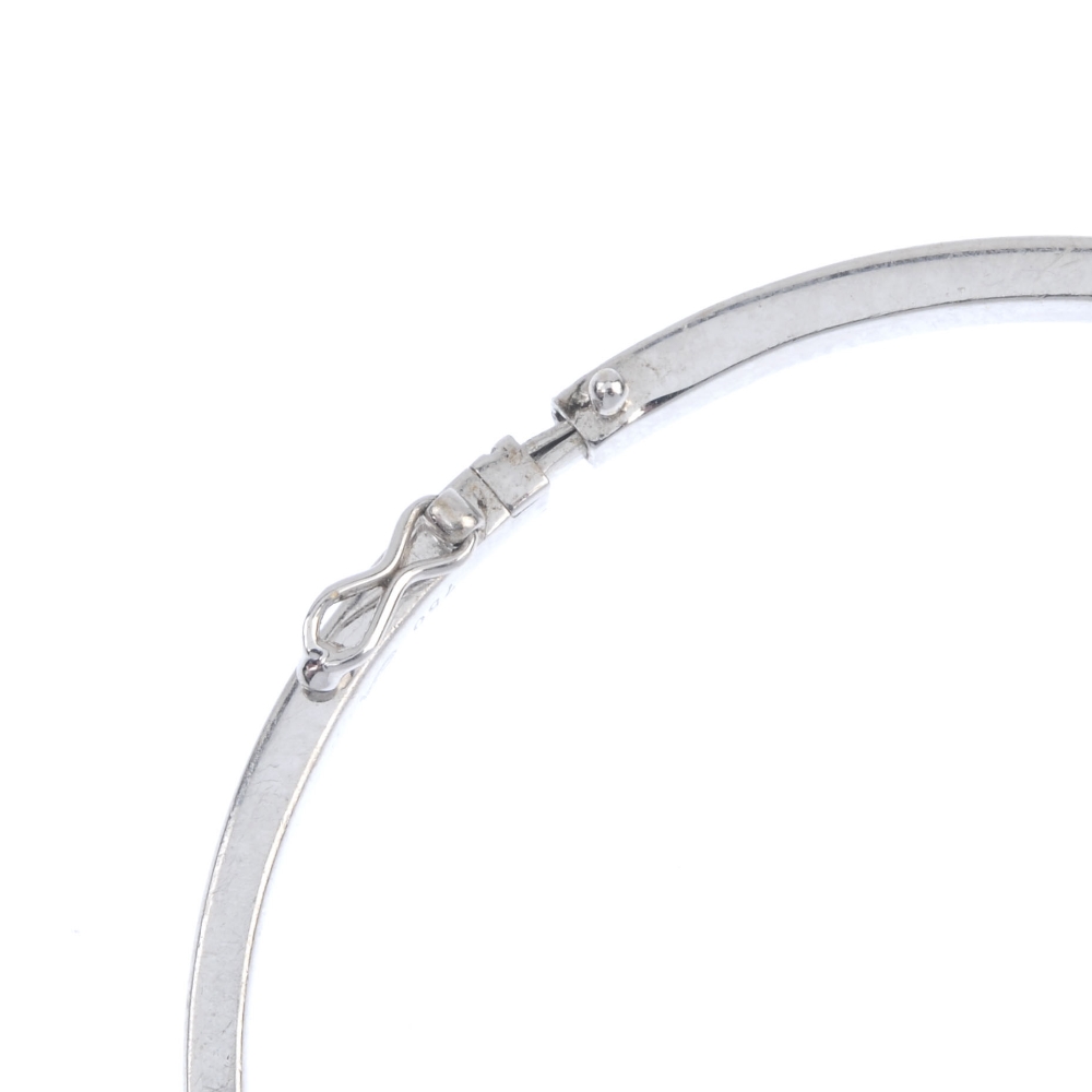 An 18ct gold diamond crossover bangle. Designed as two brilliant-cut diamond diagonal lines, to - Image 3 of 3