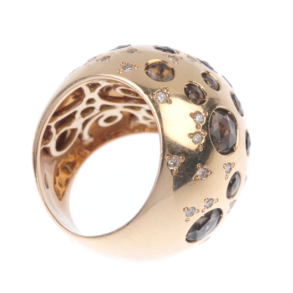 A quartz and diamond dress ring. Of abstract design, the vari-size circular-shape smoky quartz and - Image 4 of 4