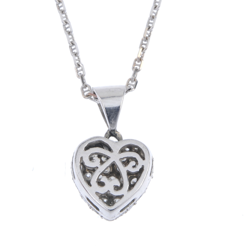 A diamond heart pendant. The pave-set brilliant-cut diamond heart, to the tapered surmount, - Image 2 of 3