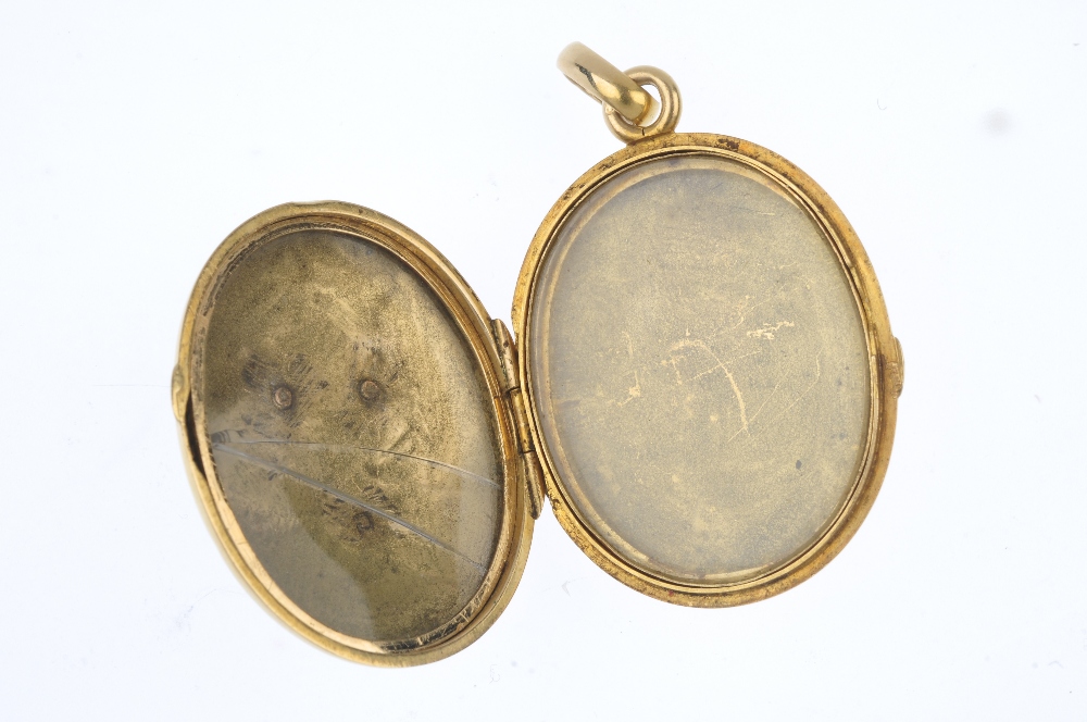 A late 19th century 18ct gold diamond and enamel locket. The rose-cut diamond floral motif, atop a - Image 3 of 3