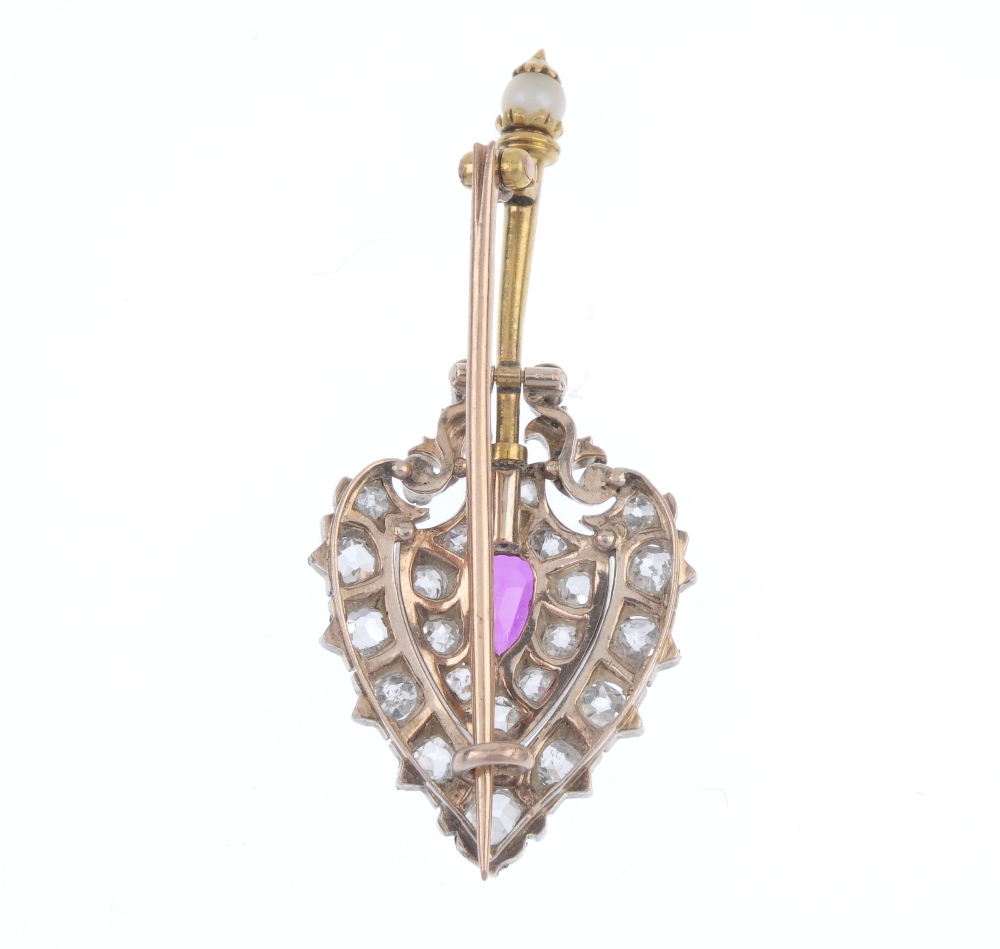 A Burmese ruby and diamond brooch. The pear-shape Burmese ruby, within an old and rose-cut diamond - Image 2 of 2