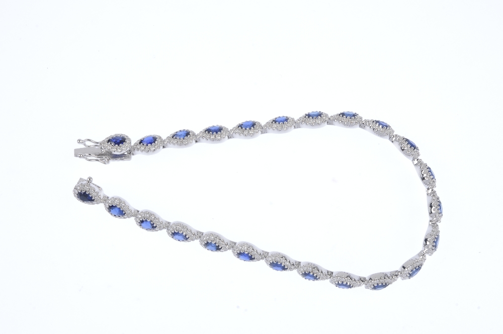 * A sapphire and diamond bracelet. Designed as a series of pear-shape sapphire and brilliant-cut - Image 3 of 3