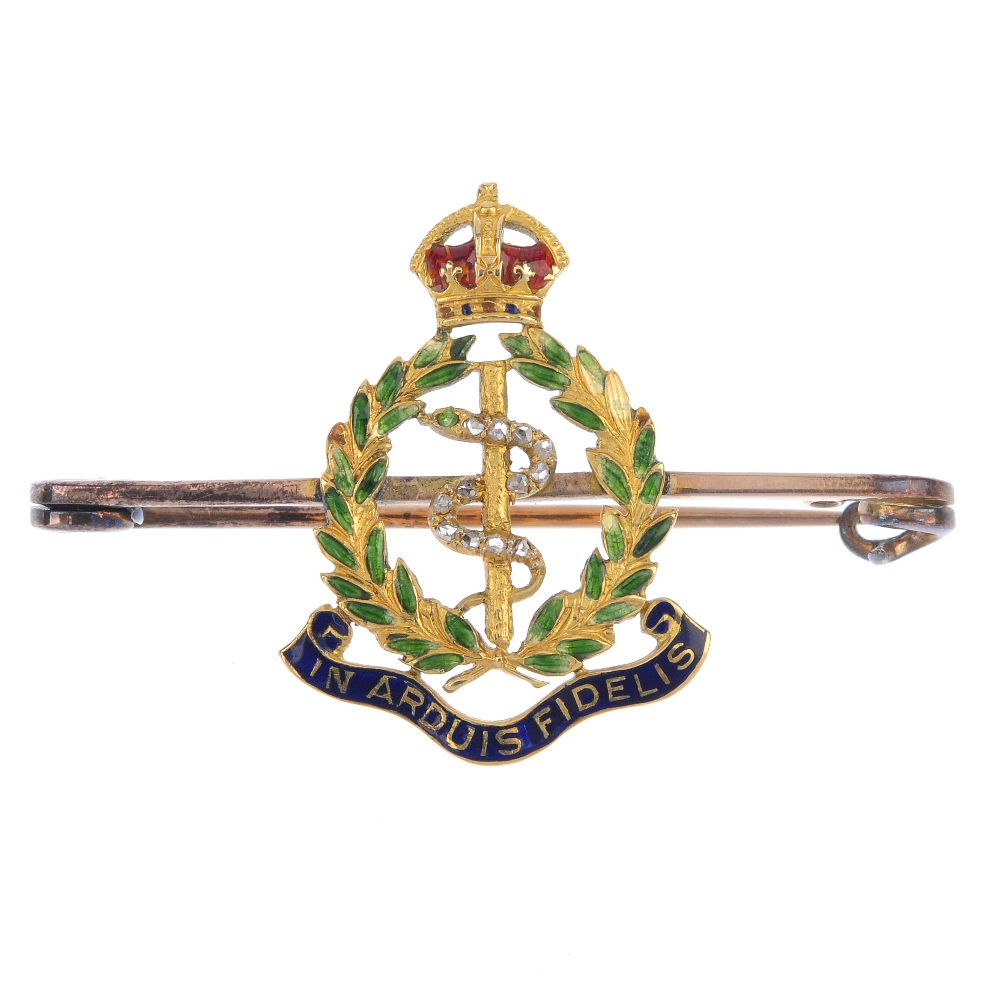 An early 20th century gold diamond and enamel Royal Army Medical Corps brooch. The rose-cut